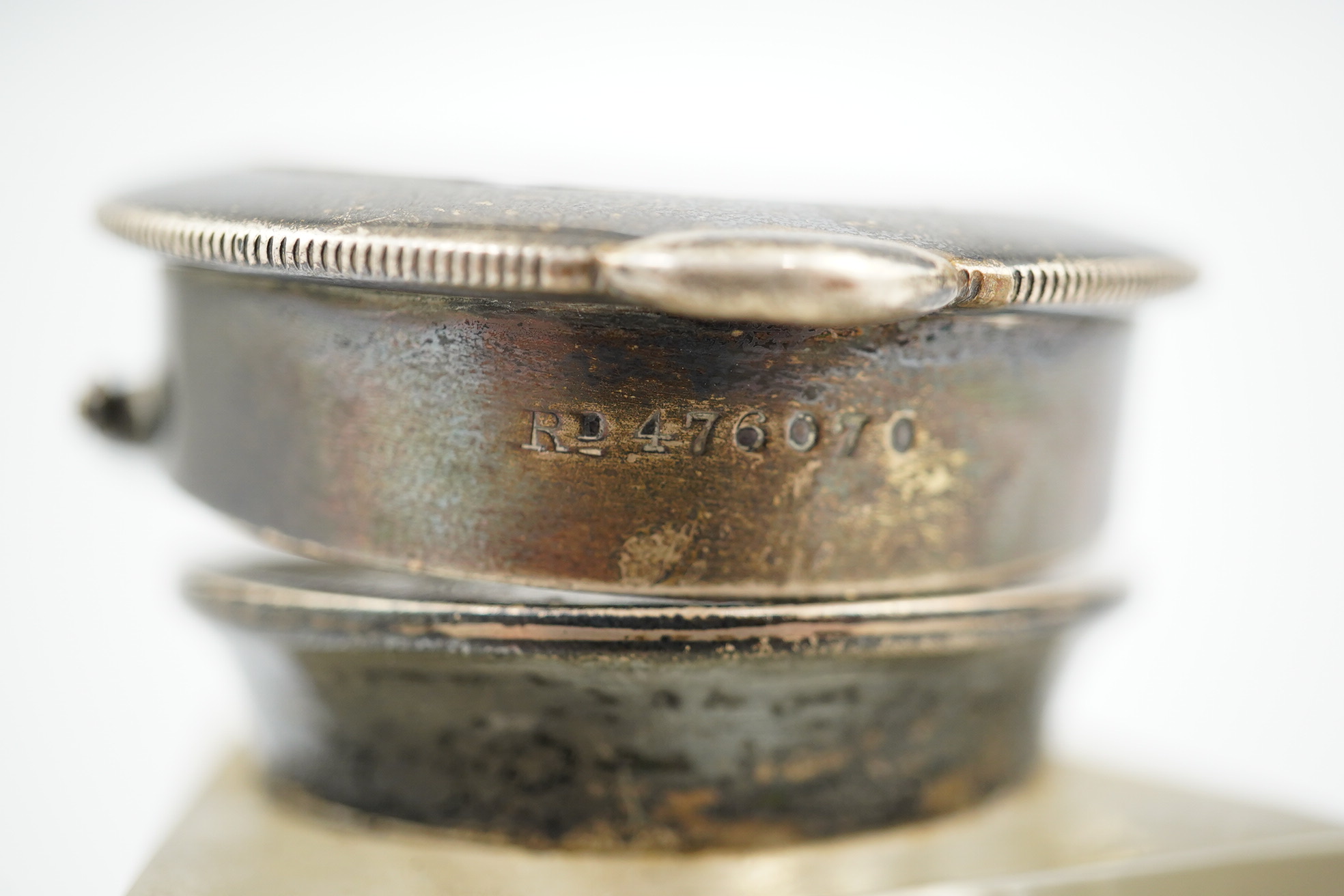 An Edwardian silver watch mounted glass inkwell, maker's mark rubbed